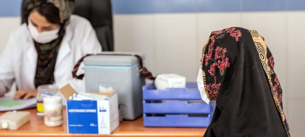 The WHO says Omicron is putting pressure on healthcare facilities around the world.