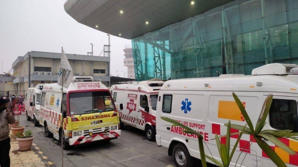 Ambulances lined up outside Amritsar airport to take the infected passengers away.