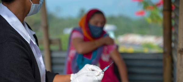 COVID vaccines are being administered at a village clinic in Kohima, India.