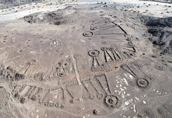 A dense ‘funerary avenue’ flanked by Bronze Age tombs, leading out of al Wadi Oasis near Khaybar in north-west Saudi Arabia.