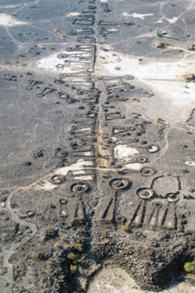 A dense ‘funerary avenue’ flanked by Bronze Age tombs, leading out of al Wadi Oasis near Khaybar in north-west Saudi Arabia.