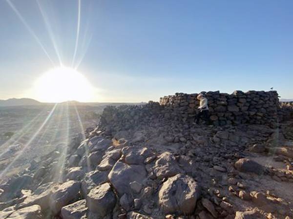 A dense ‘funerary avenue’ flanked by Bronze Age tombs, leading out of al Wadi Oasis near Khaybar in north-west Saudi Arabia.