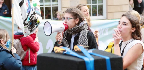 Youth climate activists demonstrate at COP26 in Glasgow, Scotland. — courtesy UNICEF/Howard Elwyn-Jones