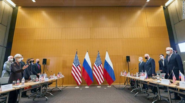 Wendy Sherman (L) and Sergey Ryabkov (R) attend security talks on Monday in Geneva, Switzerland.