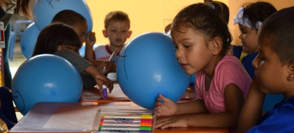 Children drawing in their classroom in the department of Arauca, Colombia.