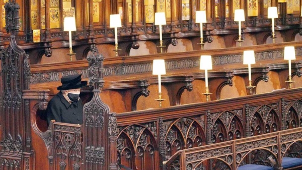 A day after the alleged parties took place, the Queen was pictured sitting alone at Prince Philip's funeral due to COVID restrictions. — courtesy photo