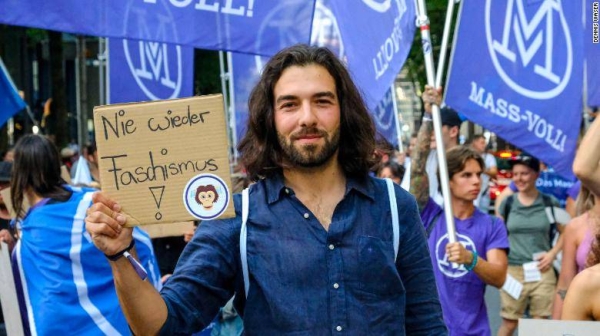 Nicolas Rimoldi at a protest this year. He says his movement, which campaigns against vaccine passports, is 