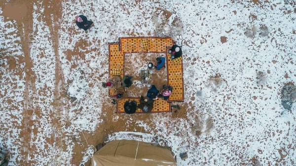 Jabal Al-Lawz is still witnessing snowfall with rain, which marks a climate phenomenon that beautifies the northern region of Tabuk at this time of every year.