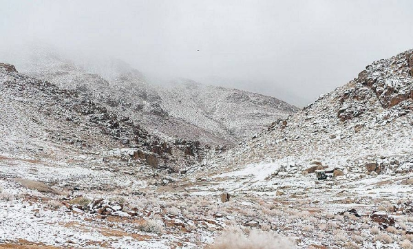 Jabal Al-Lawz is still witnessing snowfall with rain, which marks a climate phenomenon that beautifies the northern region of Tabuk at this time of every year.