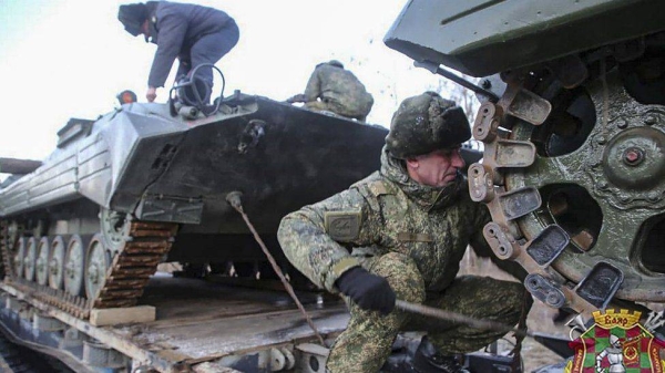Belarus's defense ministry released photos showing Russian troops and tanks arriving for drills.