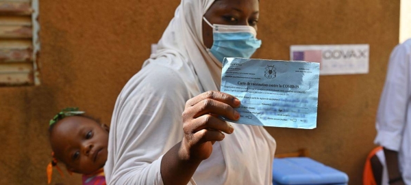 A woman is vaccinated against COVID-19 at a health centre in the Obassin region of Burkina Faso.