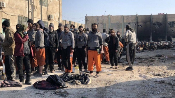 A photograph posted by SDF spokesman Farhad Shami showing suspected IS militants surrendering at Ghwayran prison in Hasaka, Syria.