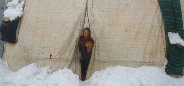 Snow has fallen in the Association displaced persons camp in Selkin city, northwest Syria.