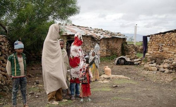 A displaced mother cooks for her family in Afar, Ethiopia. — courtesy WFP/Claire Nevill
