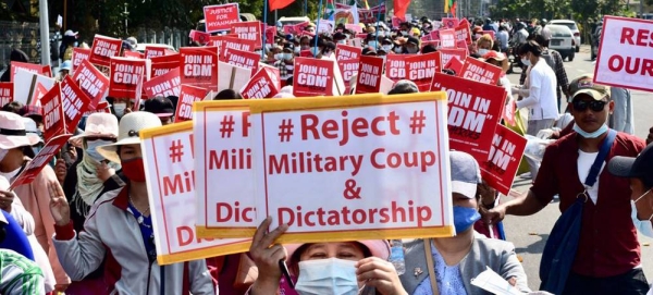 Protesters attend a march against the military coup in Myanmar. — courtesy Unsplash/Pyae Sone Htun