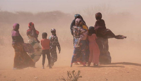 Women and children in a sandstorm in the Somali region of Ethiopia.