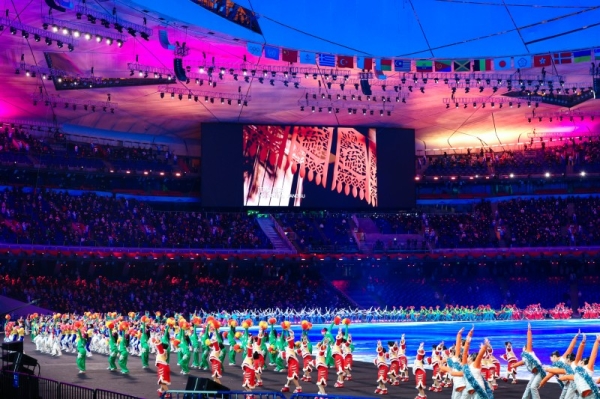 A Xinjiang government video showed children dancing and singing with the official Beijing 2022 slogan on screen.