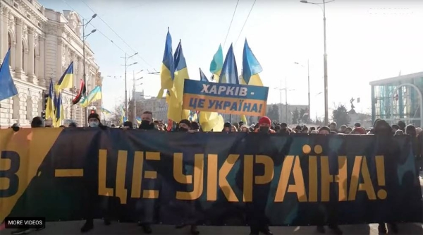 Ukrainian protesters march against the gathering war clouds amid a Ukraine-Russia standoff.