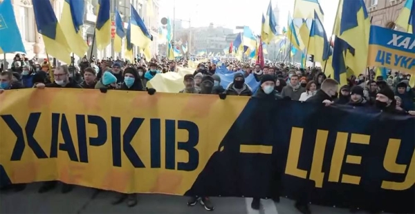 Ukrainian protesters march against the gathering war clouds amid a Ukraine-Russia standoff.