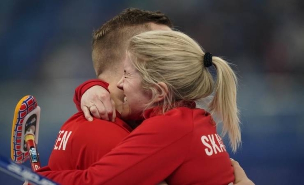 Italy clinches its 1st-ever Olympic curling medal