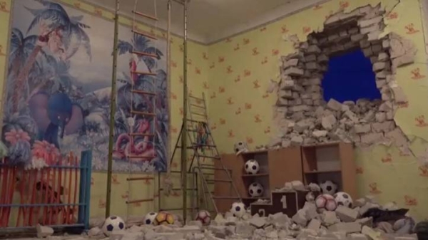 The aftermath of a shell hitting a Ukrainian nursery school.