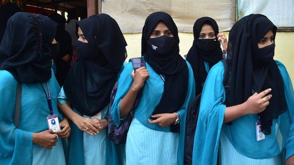 The row over headscarves has sparked countrywide protests.