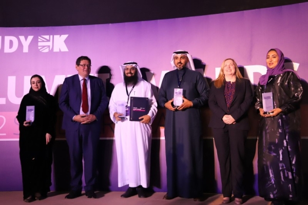 British Ambassador to Saudi Arabia Neil Crompton poses for a photo along with the Saudi winners of the Study UK Alumni Awards at a ceremony in Riyadh.