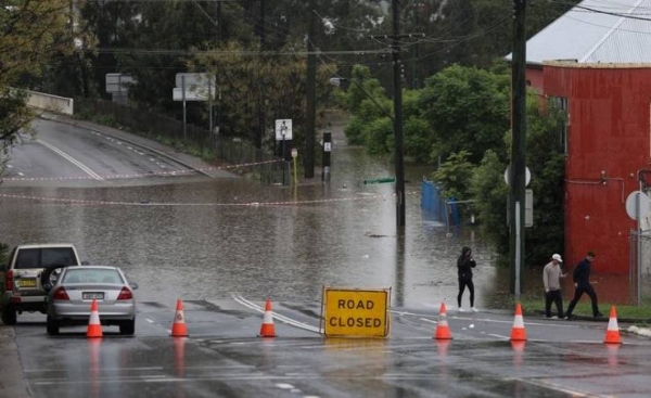 Sydney faces more rain as death toll from Australian floods rises