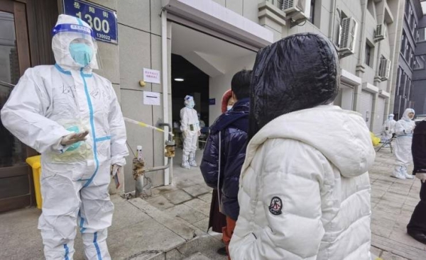 China locks down city of 9 million amid new spike in cases