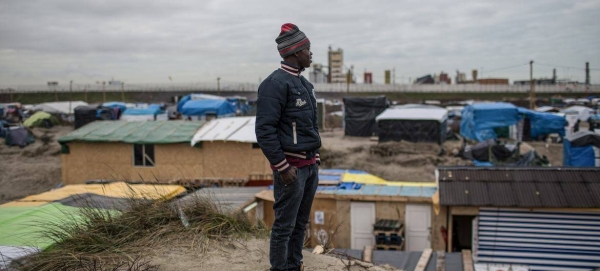 A young migrant from Darfur waits to reach England from Calais, France.
