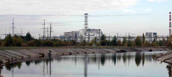 The damaged unit 4 reactor and shelter at Chernobyl, Ukraine. — courtesy IAEA/Dana Sacchetti