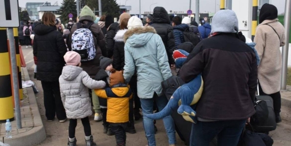 Ukrainian refugees at Poland border.