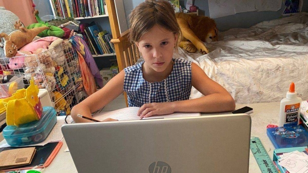 Nine-year-old Elin, in Trinidad and Tobago, has been attending school via online learning from her bedroom for two years now.
