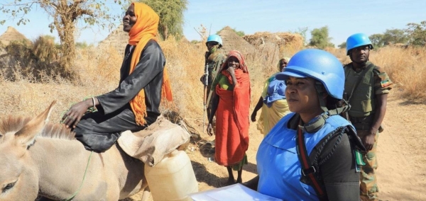 UNAMID peacekeepers provide protection to local women in Aurokuom village farming area south Zalingei, Central Darfur.