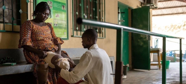 A 33-year old landmine survivor tries on a new prosthesis at the fitting and rehabilitation center in Kabalaye, Chad.