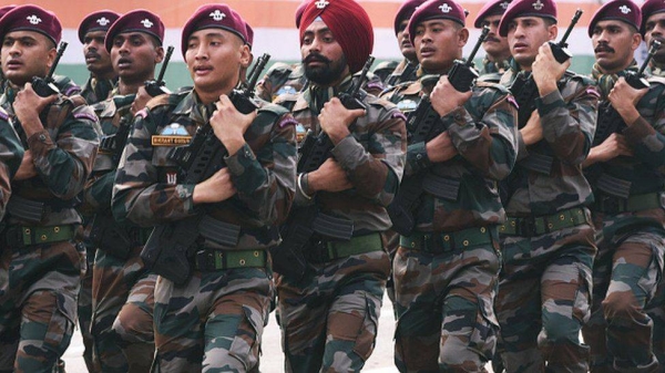 Indian army's paratrooper special force soldiers march past during the Republic Day parade in Kolkata on January 26, 2022.