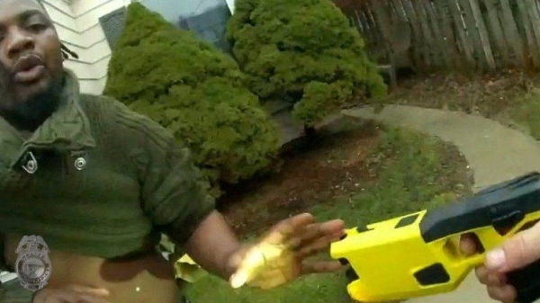 Patrick Lyoya blocks a taser weapon held by a police officer following a traffic stop in Grand Rapids, Michigan, on 4 April 2022.