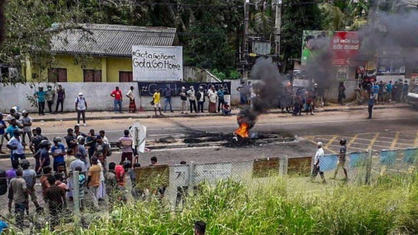 Protesters blocked a road and set alight tyres in Rambukkana.