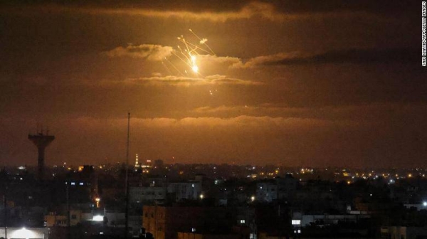 Israel's Iron Dome air defense system launches missiles to intercept rockets fired from Gaza.
