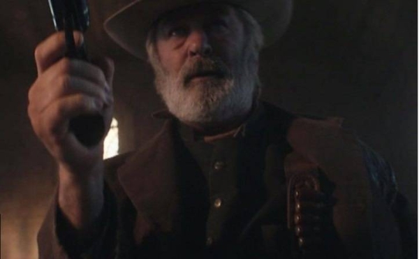 Alec Baldwin rehearses with a gun before the fatal shooting.
