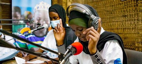 

A young journalist from Timbuktu presents the evening news on Radio Jamana, in Koulikoro, Mali. — courtesy UNICEF/Seyba Keïta