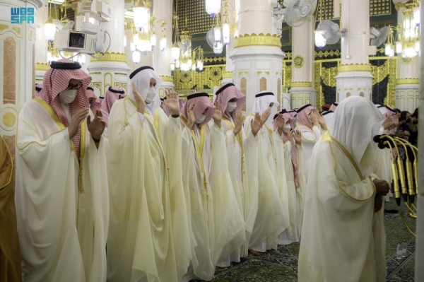 Muslims perform Eid Al-Fitr prayer in Makkah on Monday morning.