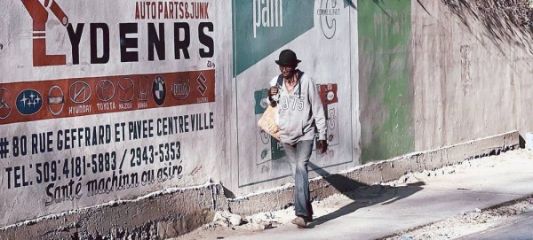 A man walking in Delmas, Port au Prince, Haiti. — courtesy Borja Lopetegui Gonzalez UNDP Haiti
