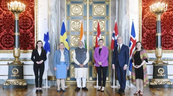 French President Emmanuel Macron and his wife Brigitte Macron welcome Indian Prime Minister Narendra Modi at the Élysée Palace on Wednesday.


