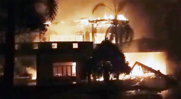 Former Prime Minister Mahinda Rajapaksa, the president's elder brother and a two-time former president, is holed up in a naval base in the north-east for his own safety.