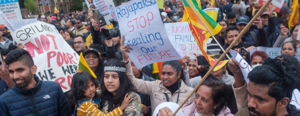 Demonstrators voice their grievances against the Sri Lankan government at a protest in London, UK.