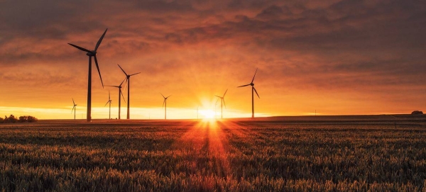 The sun sets on a windfarm in Germany.