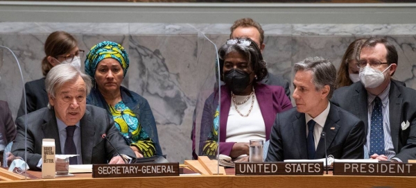 UN Secretary-General António Guterres addresses a Security Council meeting on conflict and food security, chaired by US Secretary of State Antony Blinken (right).
