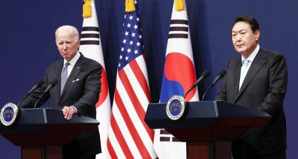 President Yoon Suk-yeol (R) speaks during a joint news conference with US President Joe Biden after their talks at the presidential office in Seoul on Saturday. — courtesy Yonhap