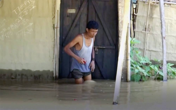 Severe flooding in the eastern Indian state of Assam has displaced tens of thousands and killed at least 24 people.